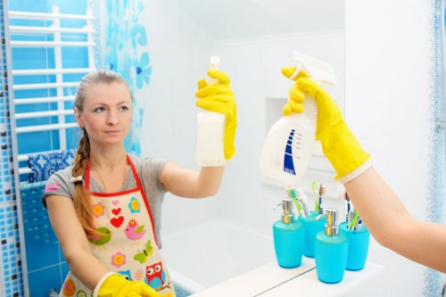 Professional Pimlico cleaner preparing a tidy home interior