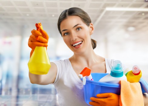 Cleaning a shared hallway in a Pimlico residential block